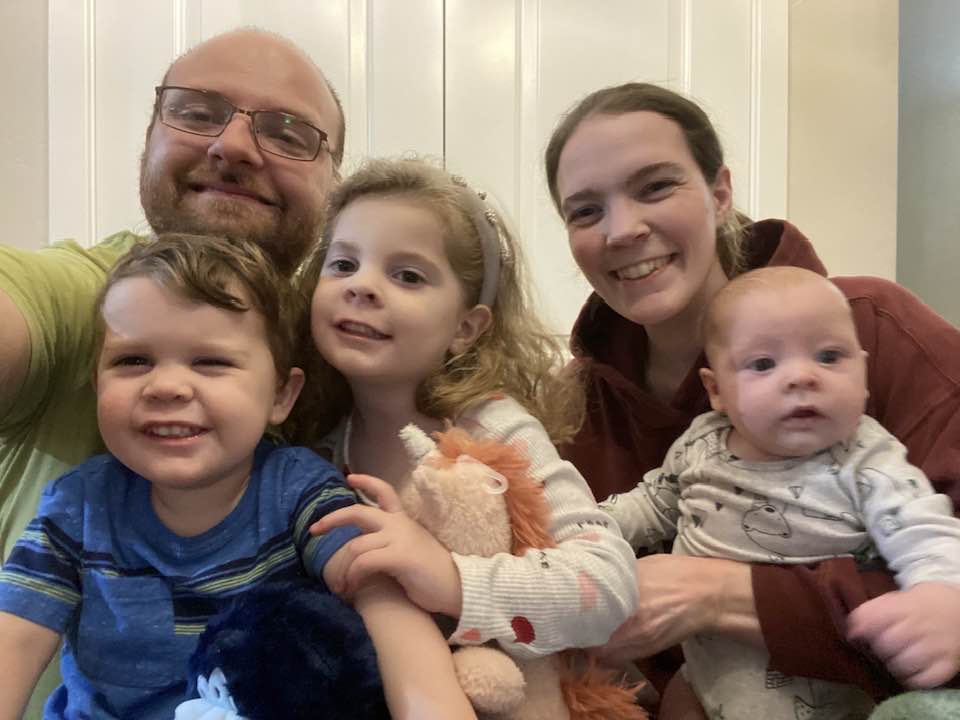 Jon taking a selfie with his family. 