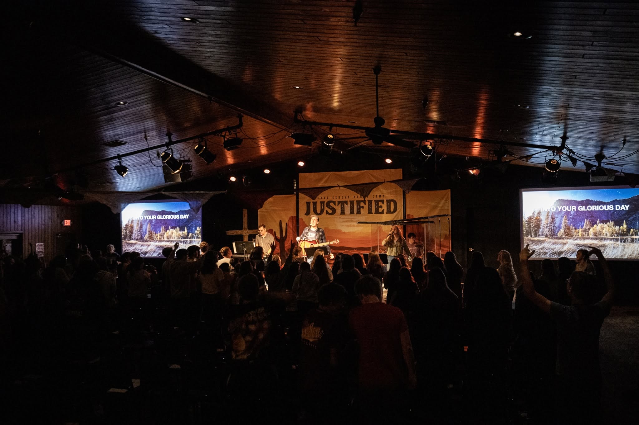 camp chapel with orange banner that says "JUSTIFIED"