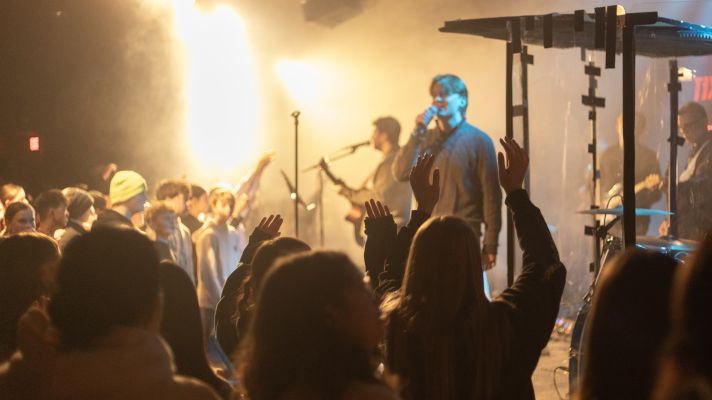 group of students worshipping in the chapel.