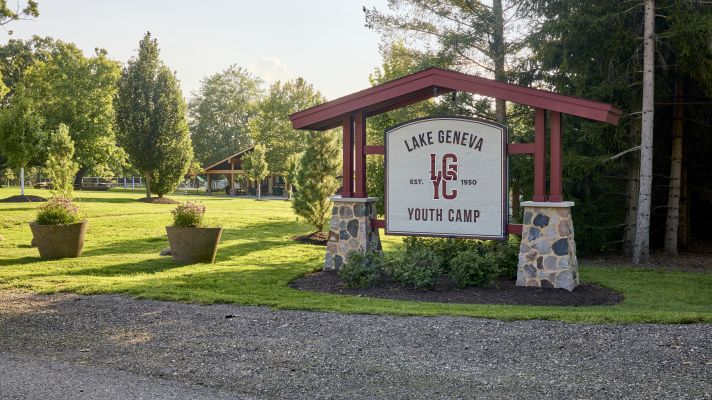 sign that says Lake Geneva Youth Camp