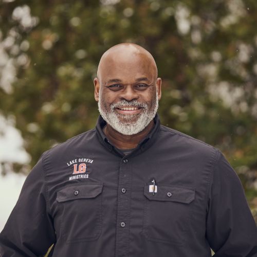 portrait shot of man with LGM button up on
